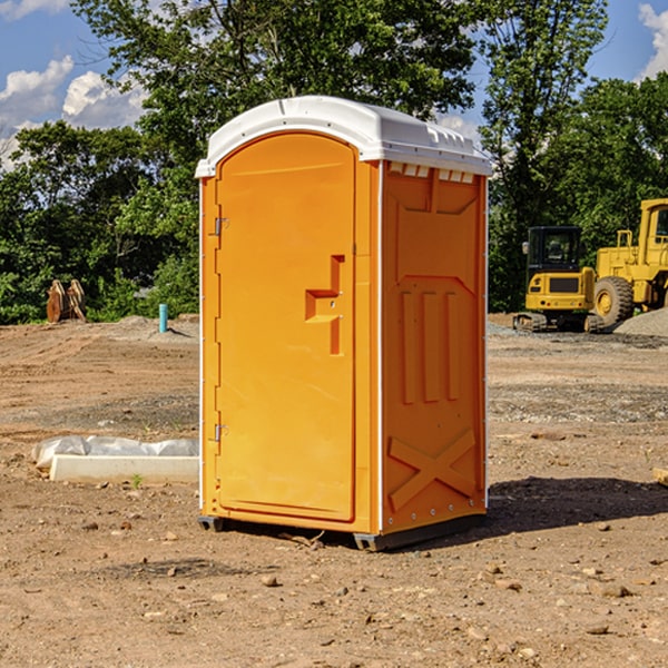 how often are the portable restrooms cleaned and serviced during a rental period in Owen